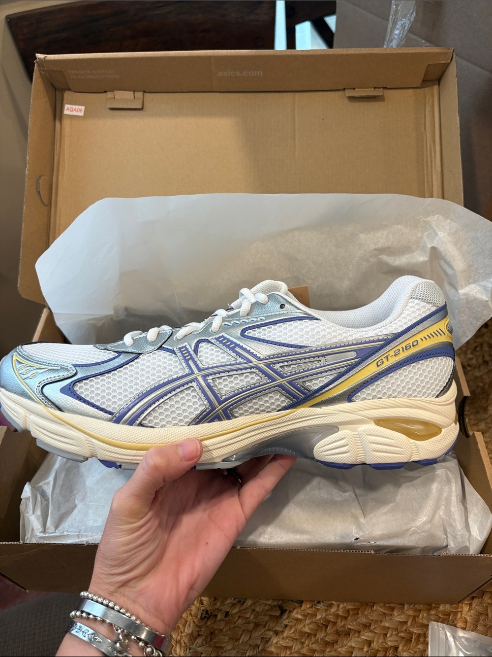 Asics White Mesh Running Sneakers with Blue and Yellow Accents